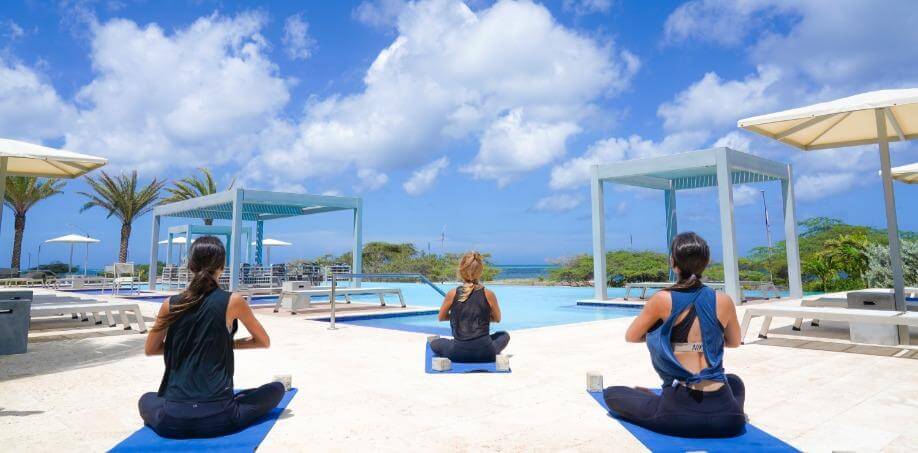 People doing yoga in Aruba at and Aruba massage and spa center