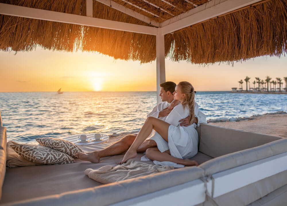 View couple on the water enjoying an Aruba honeymoon